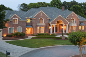 a large home with a grey roof